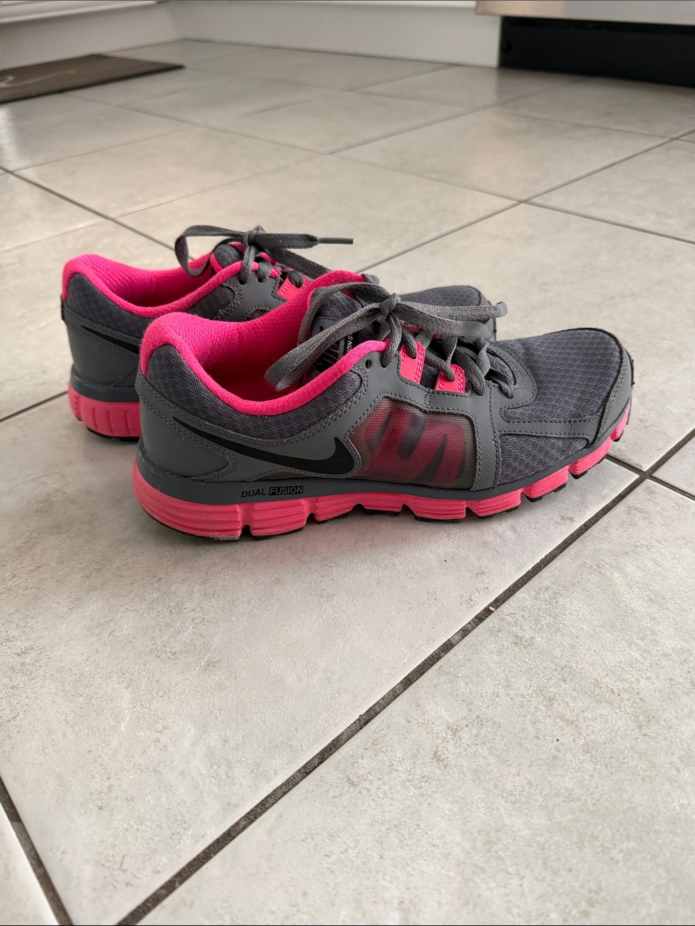 Size 9 Nike Women's Gray and Hot Pink Athletic Running Shoes